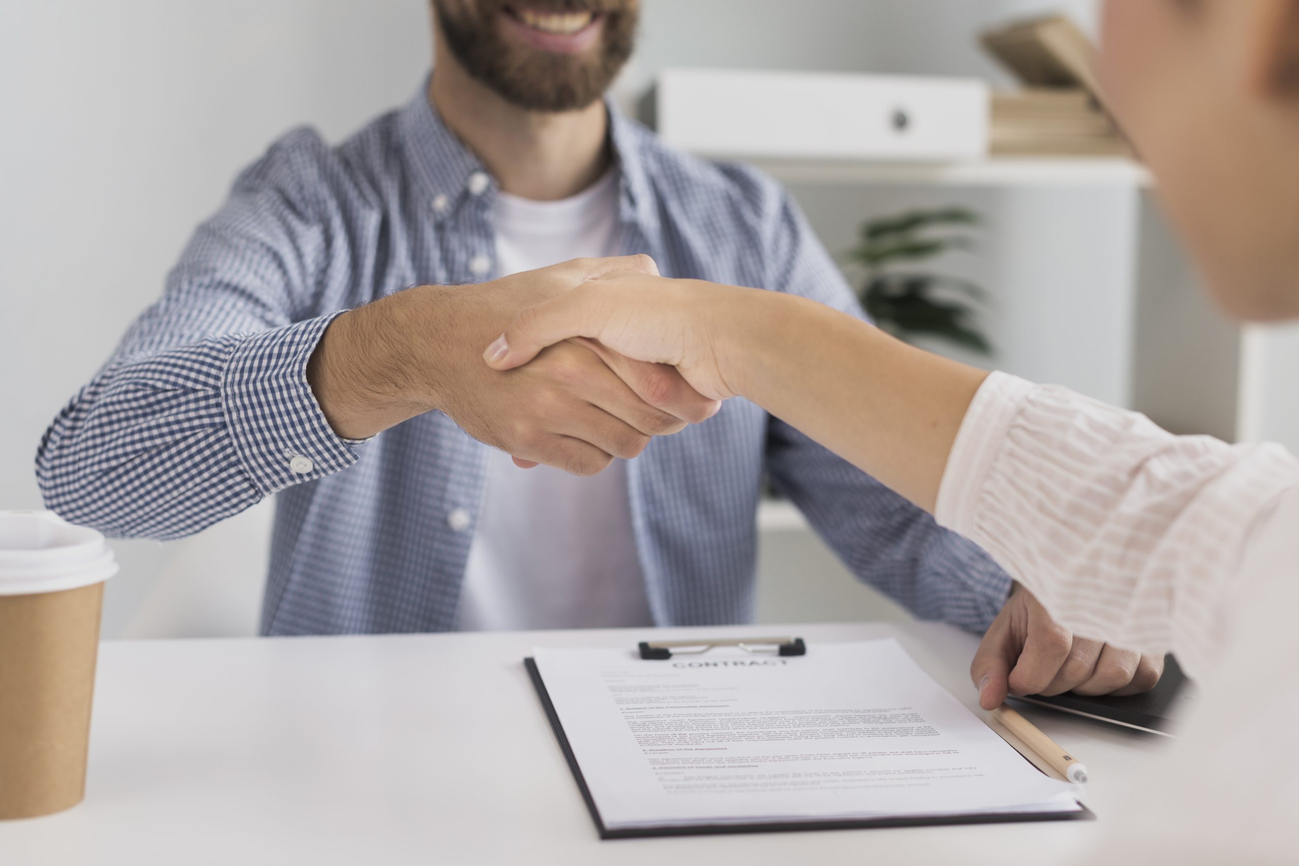close-up-business-meeting-handshake